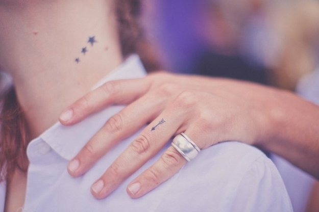 tiny minimalist tiny sparkle tattoo