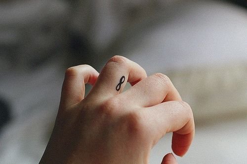 tiny minimalist tiny sparkle tattoo