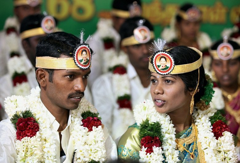 Brand Amma Reach New Heights As Couples Bear Her Pictures During Mass