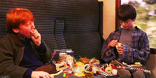 Ron and harry eating candies